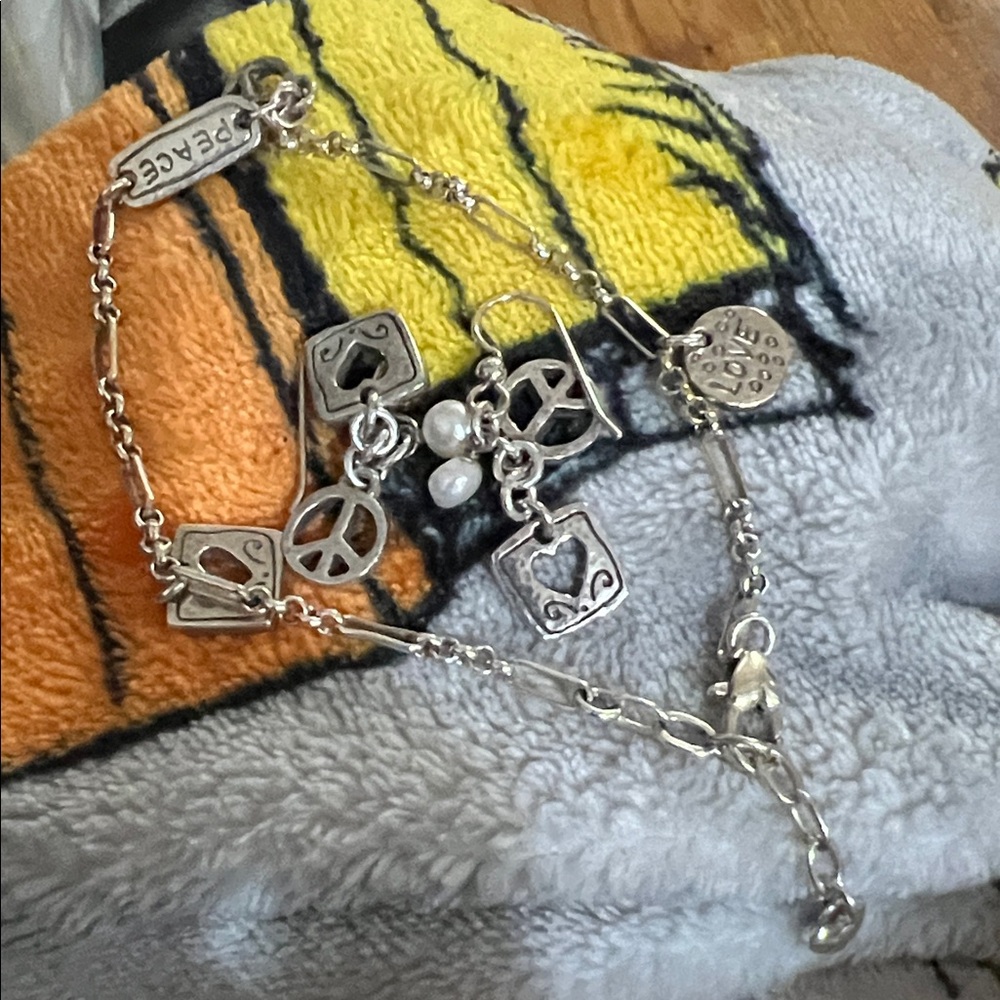 Brighton Silver Peace Charm Bracelet. Used in good condition